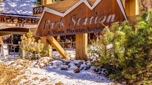A wooden sign with 'Park Station' and '950' indicating a location. - Fully Renovated Condowith Patio, Wood Fireplace & Hot Tub (Park City)