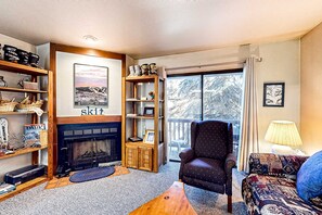 Living area - Charming & sunlit ski getaway with fireplace & balcony - close to lifts & shops (Park City)