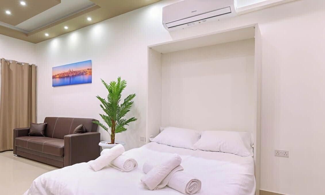 Iron/ironing board, travel crib, WiFi, bed sheets