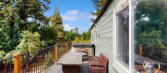Dog-friendly, riverfront home with WiFi, deck & private washer/dryer