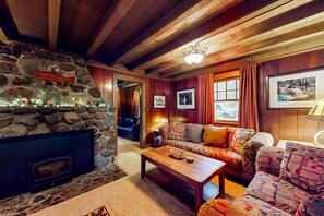 Living area - Unwind in nature's embrace at a 1925 cabin with hot tub & river views (Sandy)
