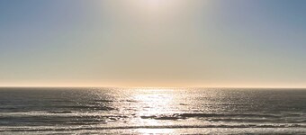 Oceanfront home with amazing sunsets, fire pit, & jacuzzi tub