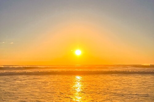Oceanfront home with amazing sunsets, fire pit, & jacuzzi tub