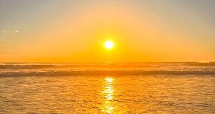 Oceanfront home with amazing sunsets, fire pit, & jacuzzi tub
