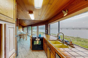 Fridge, microwave, oven, stovetop - Bayfront Home with Water Views, Free WiFi, and Firepit - Near Town & Beaches (Waldport)