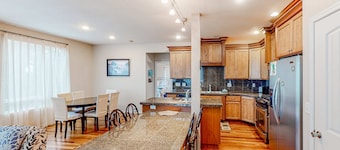 Dog-friendly sound-front cottage with fireplace, deck, lawn, beach access, & W/D