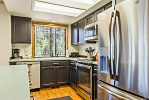 Fridge, microwave, oven, stovetop - Renovated Lodge with Private Hot Tub, SHARC Passes, and Shared Pool - Dogs OK (Sunriver)
