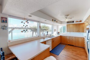 Fridge, microwave, oven, stovetop - Dog-Friendly Bayfront Home with Private Hot Tub, Water & Bridge Views, Free WiFi (Waldport)