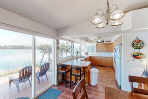 Fridge, microwave, oven, stovetop - Dog-Friendly Bayfront Home with Private Hot Tub, Water & Bridge Views, Free WiFi (Waldport)