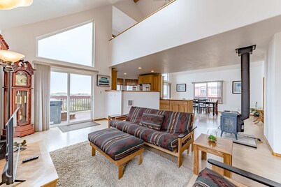 Exquisite home with spectacular views, deck, gas fireplace & game room