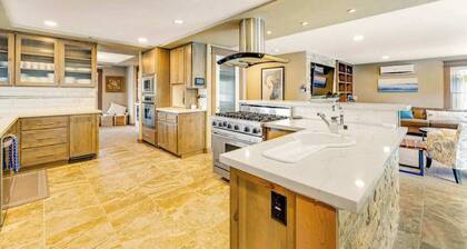 Luxurious home with 3 suites, 3 fireplaces, game room & hot tub - walk to beach