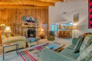 TV, fireplace, DVD player, table football - Serene Cottage on the River with Firepit, Deck, and Bunk Room (Rhododendron)