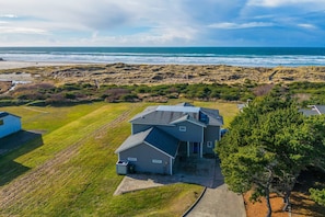 Exterior - Luxe oceanfront home with decks, grill, fireplace, gourmet kitchen, & fast WiFi (Bandon)