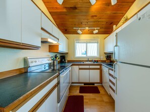 Fridge, microwave, oven, stovetop - 2-story dog-friendly home with beach access, Ping-Pong table, & grill (Manzanita)