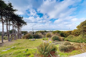 Property grounds - Spacious home with stunning ocean views, hot tub, shuffleboard, air hockey, WiFi (Waldport)