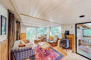 TV - Delightful coastal escape with private hot tub, generous patio, & nature views (Brookings)