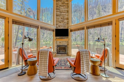 Unique riverfront home & cabin with amazing views, deck, & W&D - dog-friendly