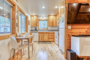 Fridge, microwave, oven, stovetop - Dog-friendly cabin with deck, fenced yard, game room, & hot tub (Rhododendron)
