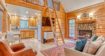 Dog-friendly cabin with deck, fenced yard, game room, & hot tub