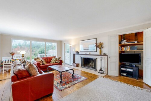 Oceanfront charmer with wood fireplace, games, & scenic deck - dog-friendly