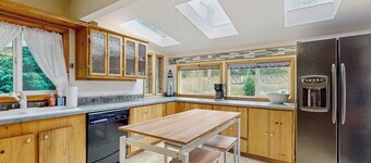 Charming home on the Siuslaw River with a fire pit, WiFi, & W&D