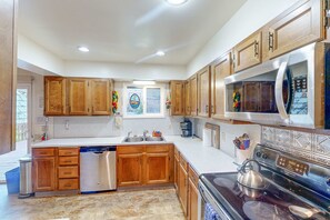 Fridge, microwave, oven, stovetop - Cozy Getaway near Beach with Partial Ocean View, Free WiFi, & Washer/Dryer (Cannon Beach)