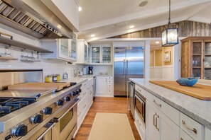 Fridge, microwave, oven, stovetop - Elegant Home with Game Room, Gourmet Kitchen, & Deck with Ocean View (Cannon Beach)