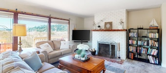 Dog-friendly house on Alsea Bay with bridge views, grill & private hot tub