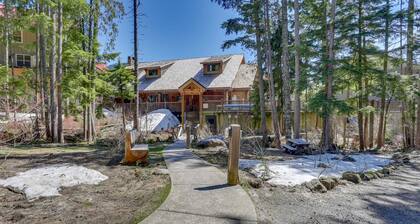 Three-story retreat with a gas fireplace plus access to pool, hot tub, & sauna
