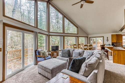 Expansive Wooded Home with a Brook, Firepit, Private Hot Tub and Shared Pool