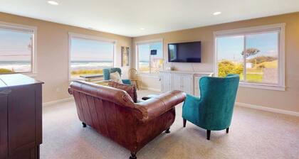 Bright, modern home with great ocean views & deck - walk to the beach