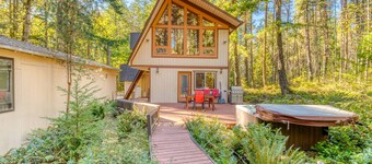 Dog-friendly, A-frame cabin with private hot tub - tranquil setting near skiing