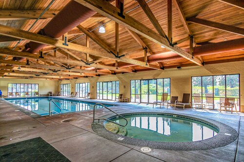 Two-Story Townhouse withFree WiFi, Fireplace, AC, Patio, & Shared Hot Tub, Pools