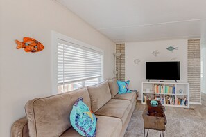 TV, stereo - Tree-lined coastal home with children's items, gas grill, and washer&dryer (Florence)