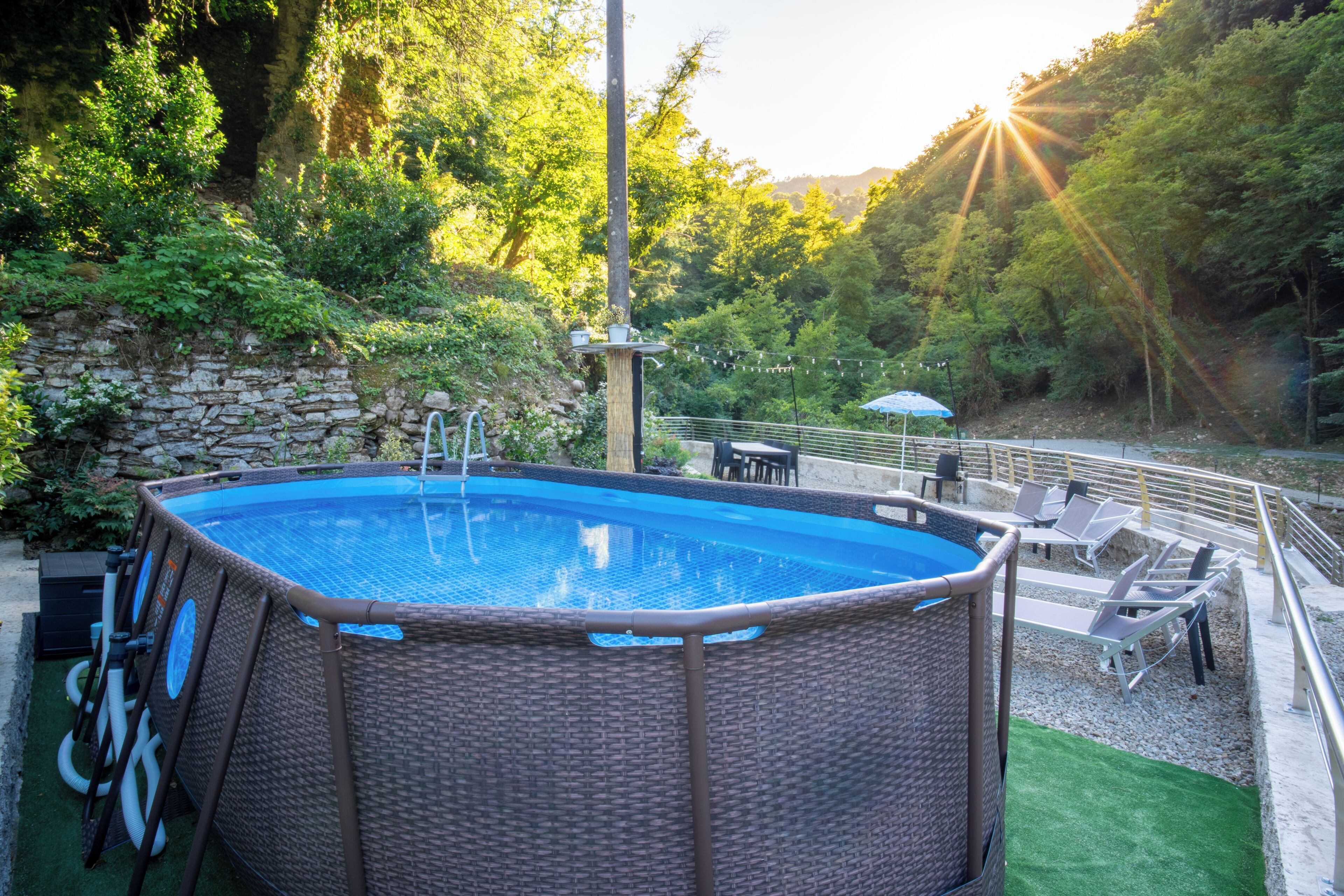Seasonal outdoor pool, pool loungers