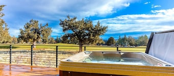 Golf course-front home with deck, hot tub, fireplace, W&D, & community pool