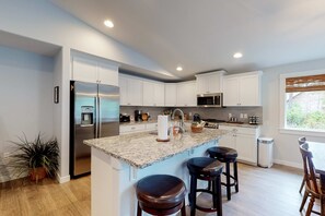 Private kitchen - Brand-new home with hot tub, deck, fast WiFi, central AC, & great location (Manzanita)