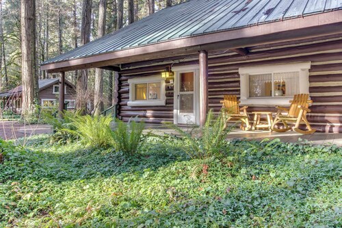 Restored log cabin w/ classic porch - near river, trails, hot springs, & more