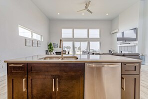 Interior - Modern & stylish getaway with fireplace, WiFi, AC, & W/D - walk to beach (Gold Beach)