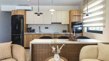 Suite, 2 Bedrooms, Private Bathroom, Beachside | Private kitchen | Full-size fridge, microwave, oven, stovetop