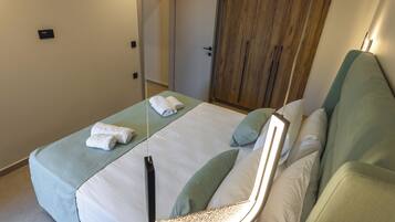 Suite, 2 Bedrooms, Private Bathroom, Partial Sea View | In-room safe, blackout drapes, soundproofing, iron/ironing board