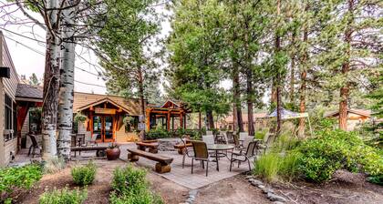 Third-floor retreat with treetop views, AC, pools, hot tubs, & sports courts