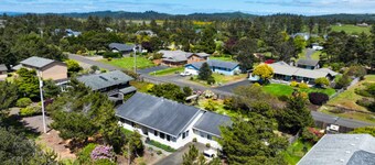 Charming home near ocean with patio, firepit, WiFi, streaming, and wood stove