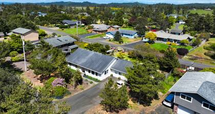 Charming home near ocean with patio, firepit, WiFi, streaming, and wood stove