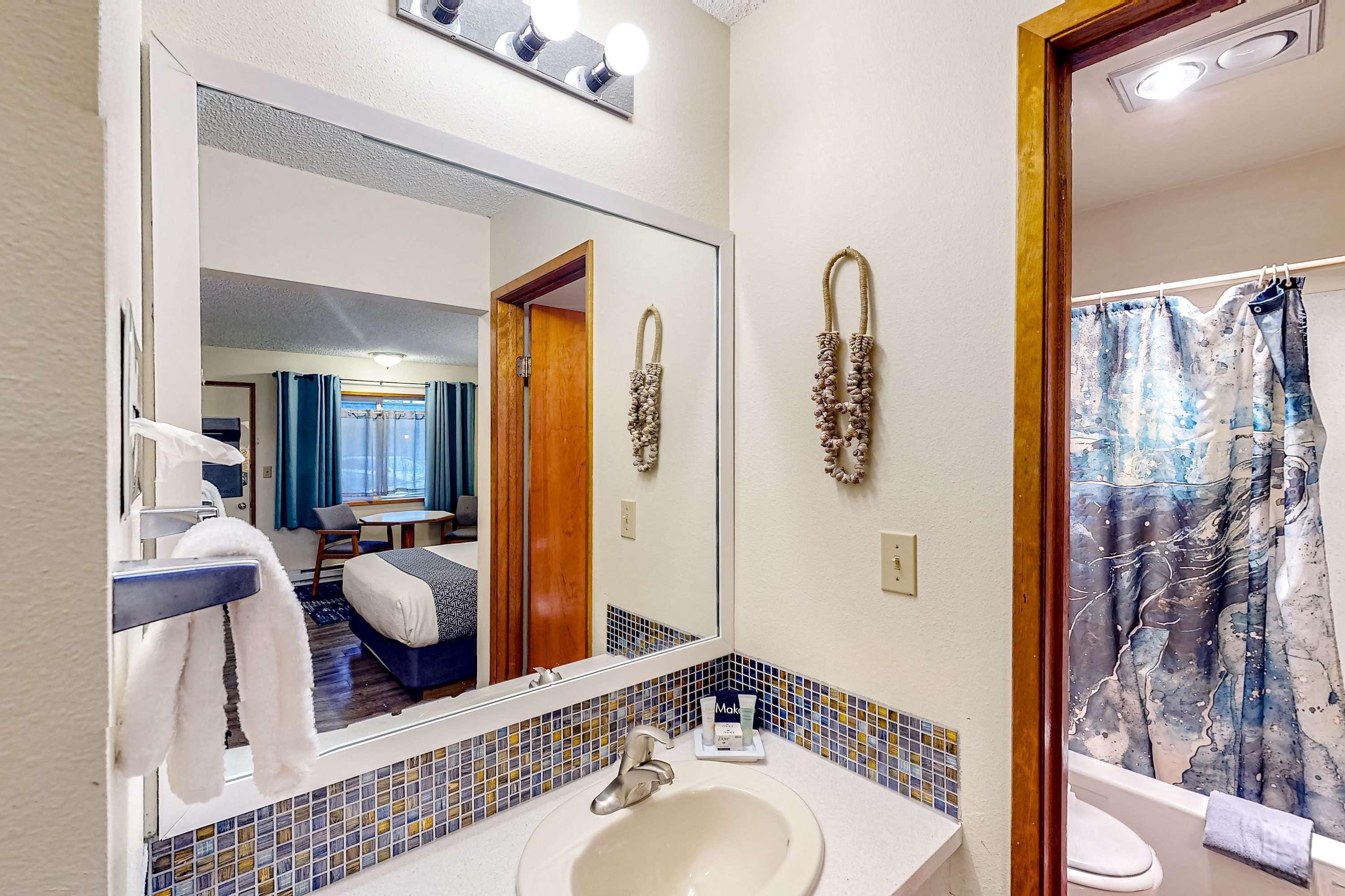 Shower, hair dryer, towels
