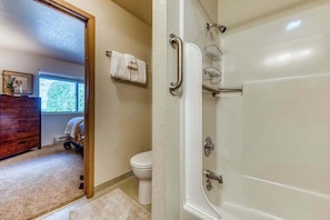 Shower, hair dryer, towels, shampoo