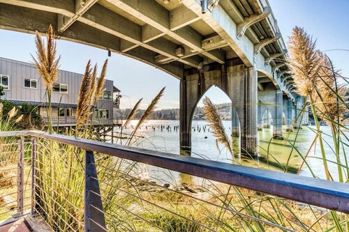 Incredible Riverfront Oasis with Wraparound Deck & Cozy Interior