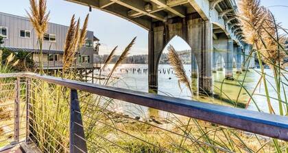 Incredible Riverfront Oasis with Wraparound Deck & Cozy Interior