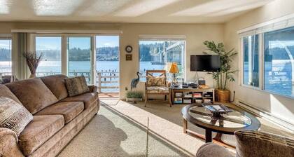 Incredible Riverfront Oasis with Wraparound Deck & Cozy Interior