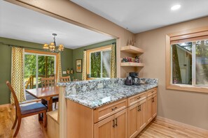 Fridge, microwave, oven, stovetop - Recently remodeled riverfront home with fireplace, firepit & W&D - dog-friendly (Rhododendron)